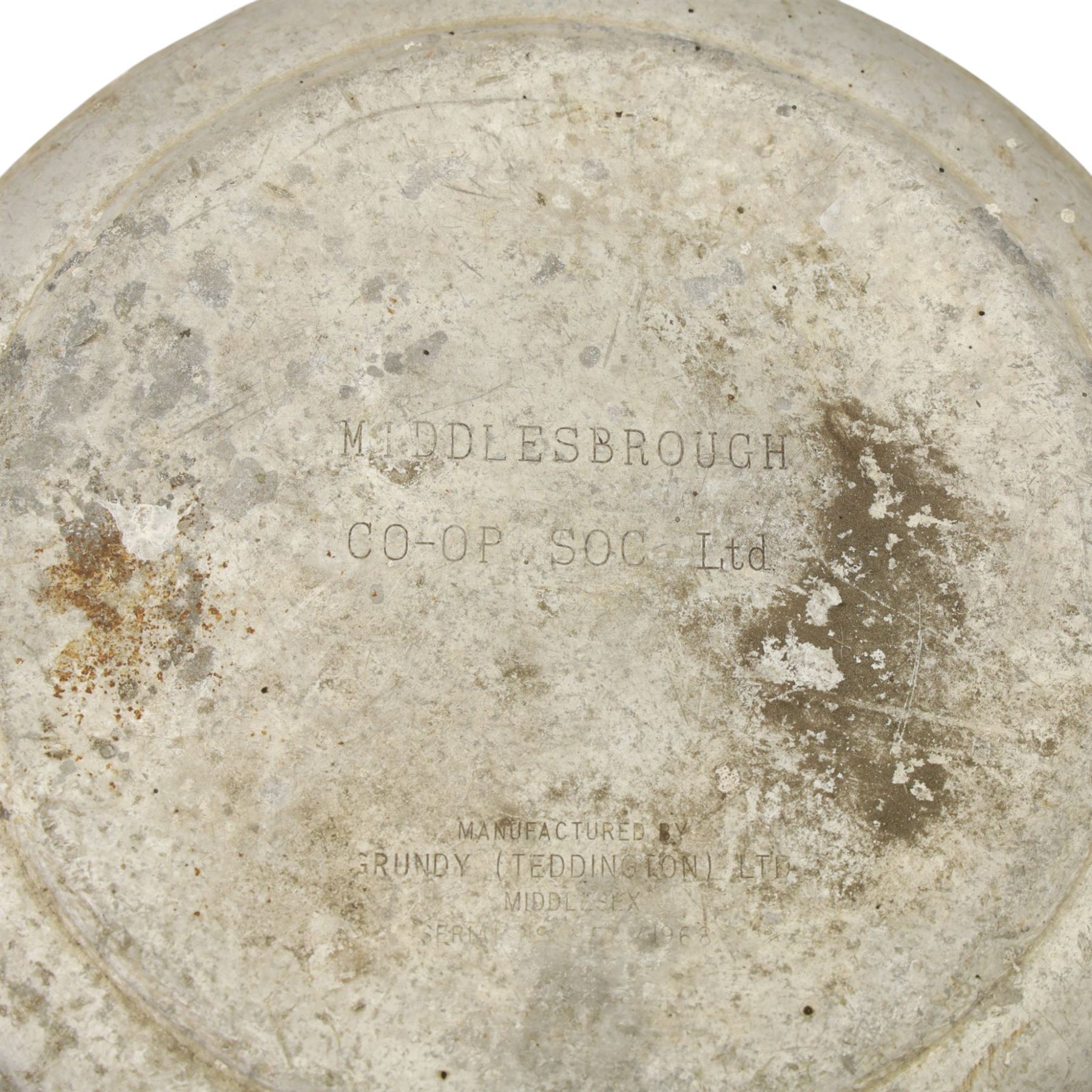 20th century aluminium set of three milk churns, with handles, baring the stamps of 'Middlesborough Co-op', 'Holme Moor', 'Wholesale Dairies' 