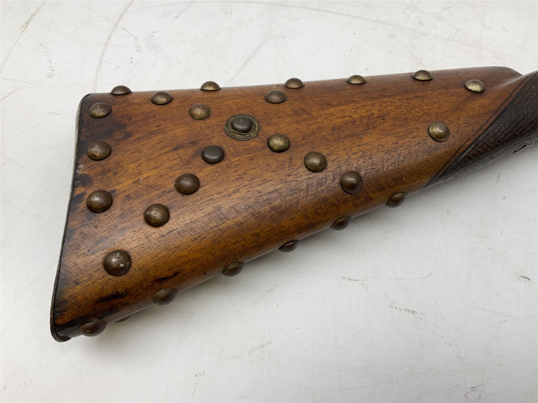 Composed decorative percussion action sporting gun, the 79cm barrel with ramrod under and Indian style studded stock L124cm overall