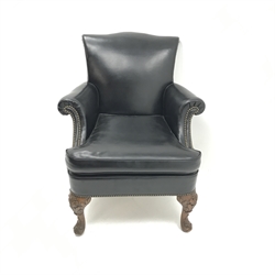 Georgian style armchair, shaped cresting rail, scrolling arms, carved cabriole suports, upholstered in studded black leather, W82cm