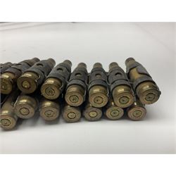 Leather covered swagger/sword stick with 40cm steel blade L62cm overall; another ash sword stick with 30cm diamond section steel blade; pair of fencing foils, the blades marked Solingen; two reproduction flintlock pistols; and 92cm inert cartridge belt (7)