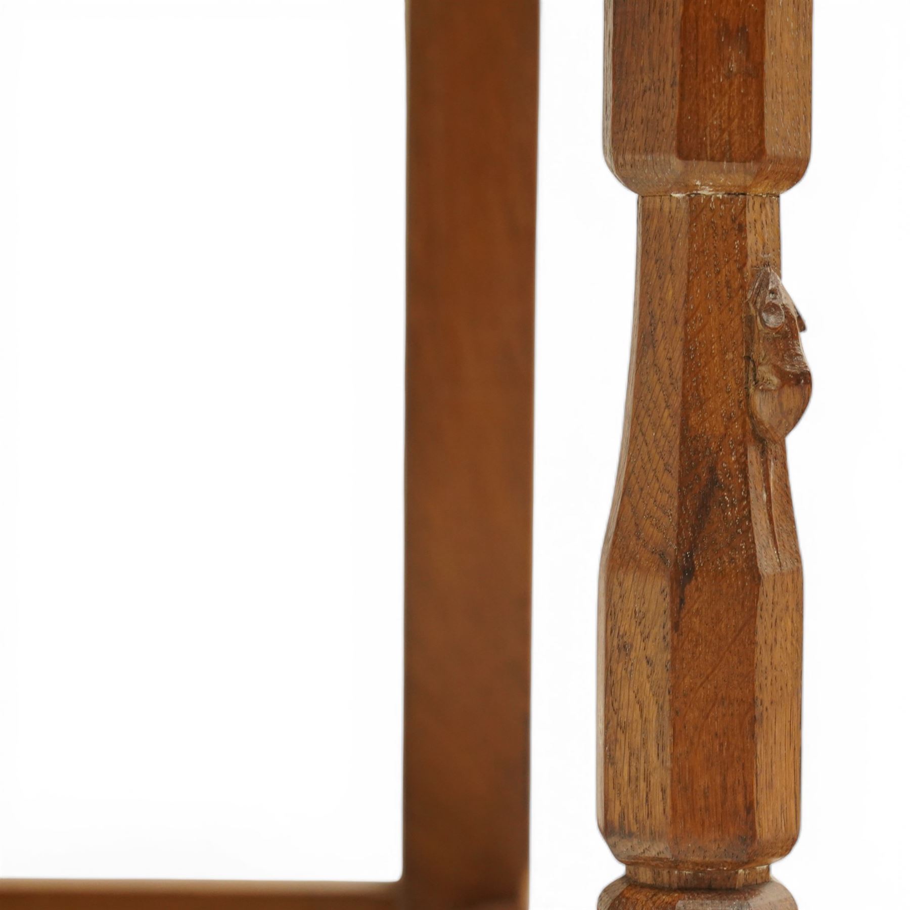Mouseman - pair of oak panel back side chairs, adzed panel back and seat, on octagonal supports, with carved mouse signature, by the workshop of Robert Thompson of Kilburn