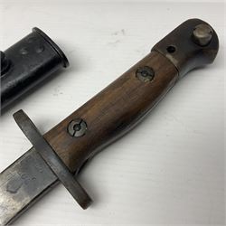 WWI British 1907 pattern bayonet, the 43cm fullered blade by Wilkinson with various marks to the ricasso; in leather covered scabbard numbered 294 to the throat and stamped M/58 L58.5cm overall