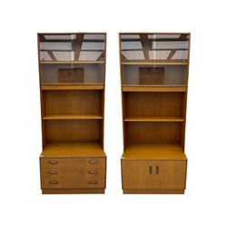 G-Plan teak two sectional modular wall display cabinet, fitted with sliding glass doors, double cupboard and three drawers