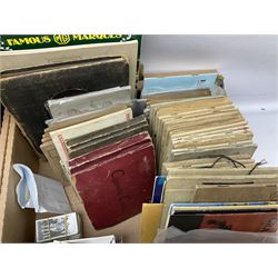 Quantity of cigarette and trade cards, housed in albums and loose, by W.D. & H.O. Wills, John Player & Sons etc, including cycling, garden hints, Britain's railways, dogs etc and various empty vintage cigarette card albums, in two boxes