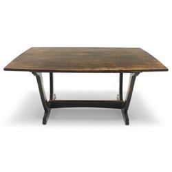 Acornman - dark stained oak dining table, rectangular top raised wishbone end supports united by stretcher, with carved acorn signature, by the workshop of Alan Grainger of Brandsby