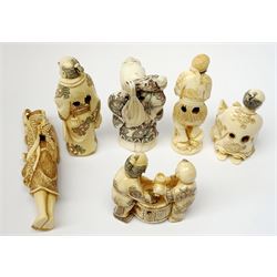 A group of six ivorine netsukes, modelled as various figural and mythological subjects, including three examples modelled as workers, and another modelled as Fukurokuju, all with character signatures, H7.5cm. 