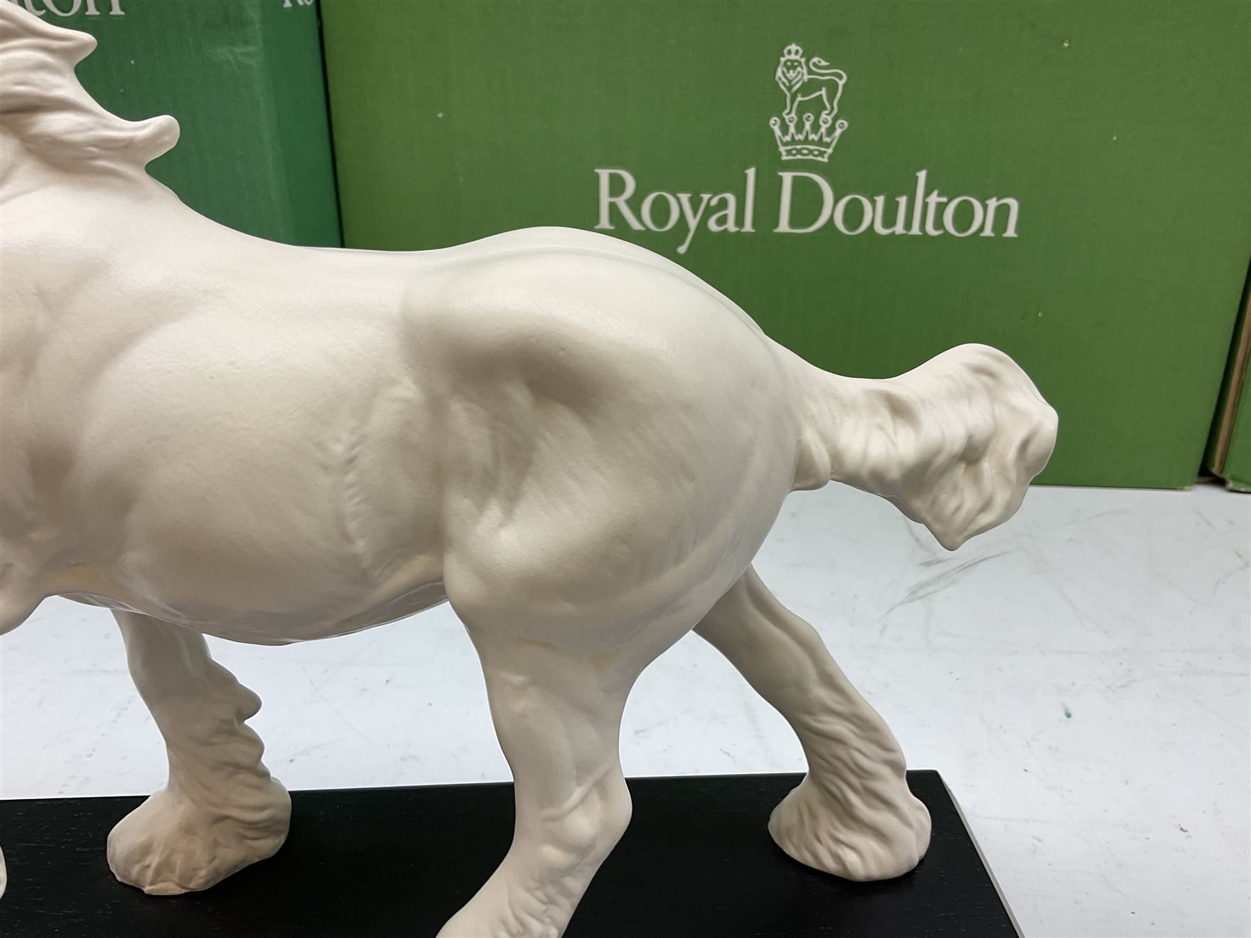 Five Beswick and Royal Doulton horse figures in matt white on black plinths, comprising of  Spirit of Affection no. 2689/2536, Springtime no.2837, Spirit of peace no.2916, Spirit of earth no.2914 and Spirit of the wild no. 183, together with a composite figure of a horse (6)