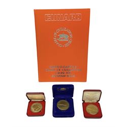 Queen Elizabeth II cradle of civilization cruise 1976 bronze medallion with related book and two other Queen Elizabeth II commemorative medallions for cruises in 1975 and 1976, all cased