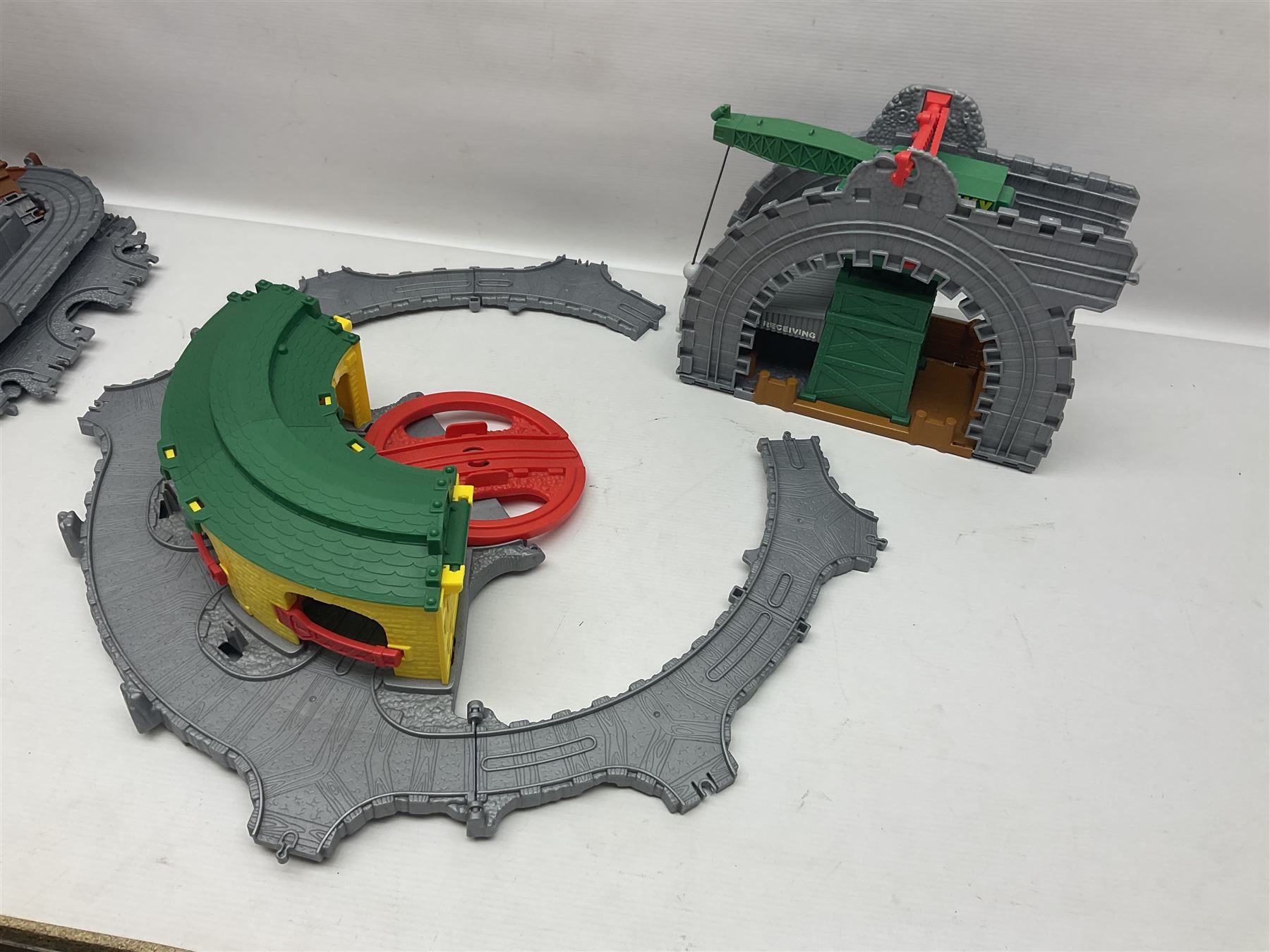 Quantity of Thomas the Tank Engine playsets and track, and Thunderbirds 2004 Tracy Island playset with some associated vehicles, in two boxes 