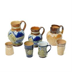 Victorian Doulton  stoneware items commemorating the 1897 jubilee including jug H23cm, two...