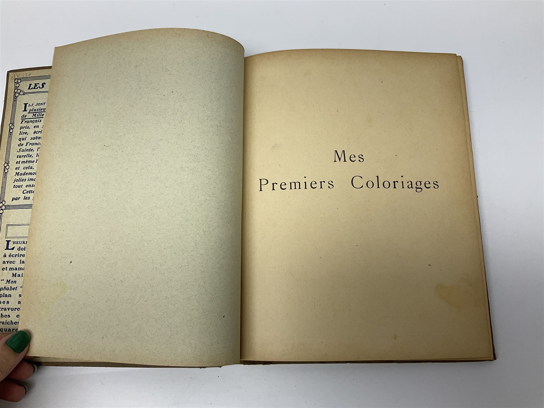 Three Childrens books, comprising Father Tuck's Once Upon a Time and two french books by Hachette et Cie, together with a folder of Ours The Magazine of Reckitts