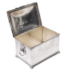 Pair of Victorian silver plated bottle coasters with turned boxwood bases D16cm, 19th century plated tea caddy engraved 'Kabul 1879' and a plated tea caddy with lion mask ring handles W16cm 