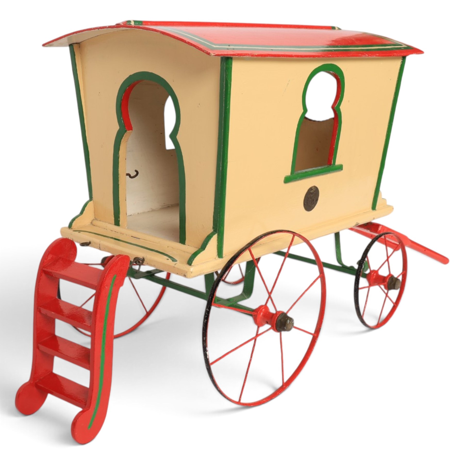 G & J Lines wooden gypsy caravan model, painted in cream with red roof, wheels and green detailing, H51cm, L89cm