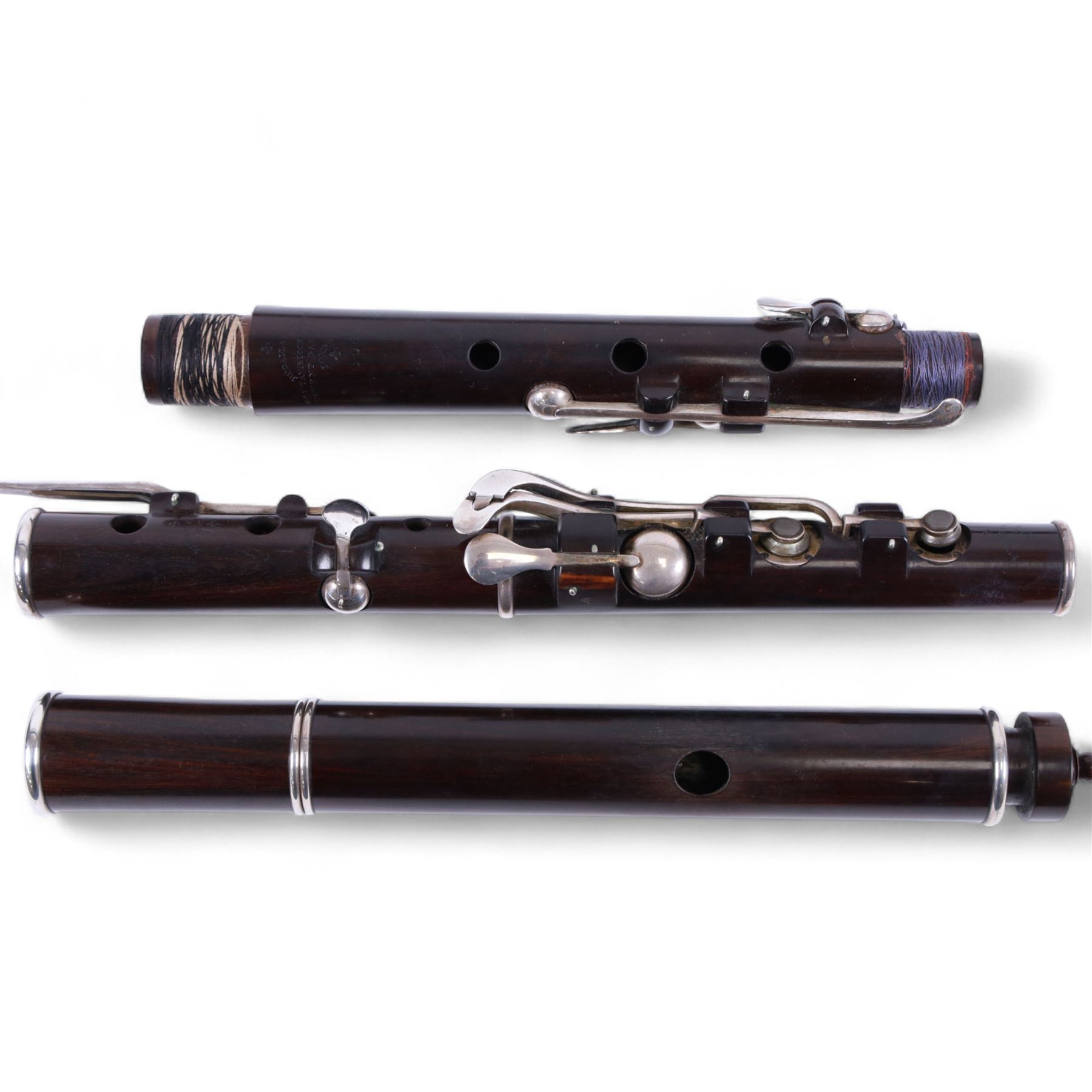 Rudall and Rose-1 Tavistock Street, Covent Garden, London, mid-19th century three piece flute c1830-50, probably crocus wood, with silver bands and keys, stamped with serial No 5060 and makers name in two places, in original velvet lined case containing makers original certificate with matching serial number. 