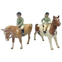 Beswick Boy on Palomino Pony no 1500 and Girl on Skewbald Pony no 1499, both with printed mark beneath 