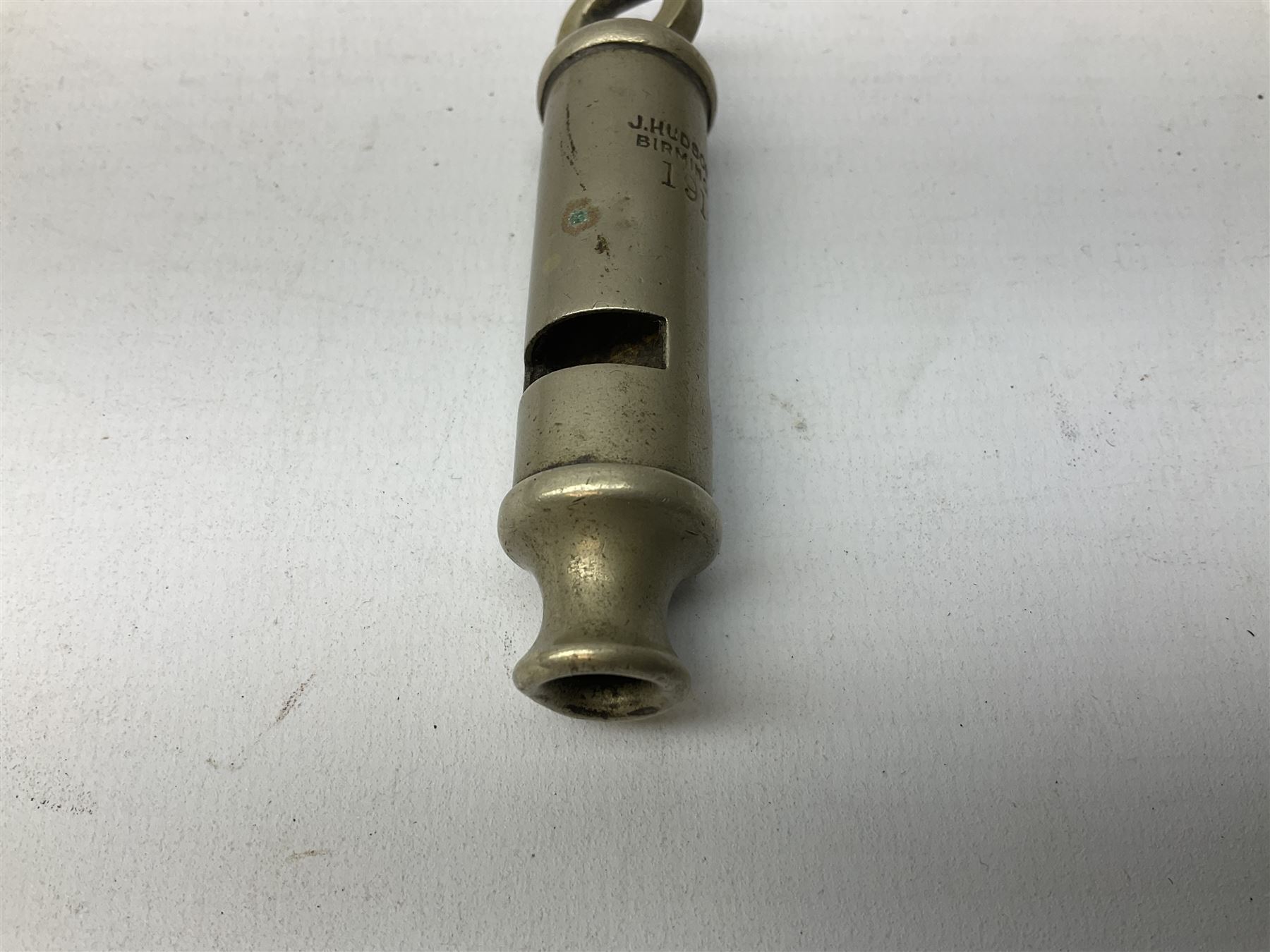 Three J Hudson & Co Birmingham military whistles, dated 1915, 1916, 1923