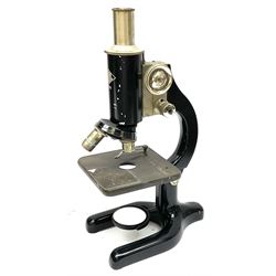 Black finished monocular microscope by Prior London No. 17372,  with pitchfork base and rack and pinion focusing, in original fitted wooden case with additional lenses, H32cm, together with Watts dumpy level, no. 116249, in a leather case