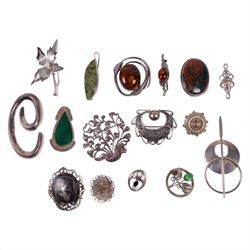 Silver brooches, including Baltic amber, moss agate and modernist examples, together with a large collection of costume brooches