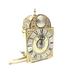  Small 18th century style Suffolk Alarm type brass lantern clock, engraved dial with cast spandrels, silvered Roman chapter and alarm, signed in arch 'Peter Aggus Fecit', with two weights and arched oak hanging bracket, H21cm, with original receipt from 1988 and a copy of 'English Lantern Clocks by W.F.J.Hana  