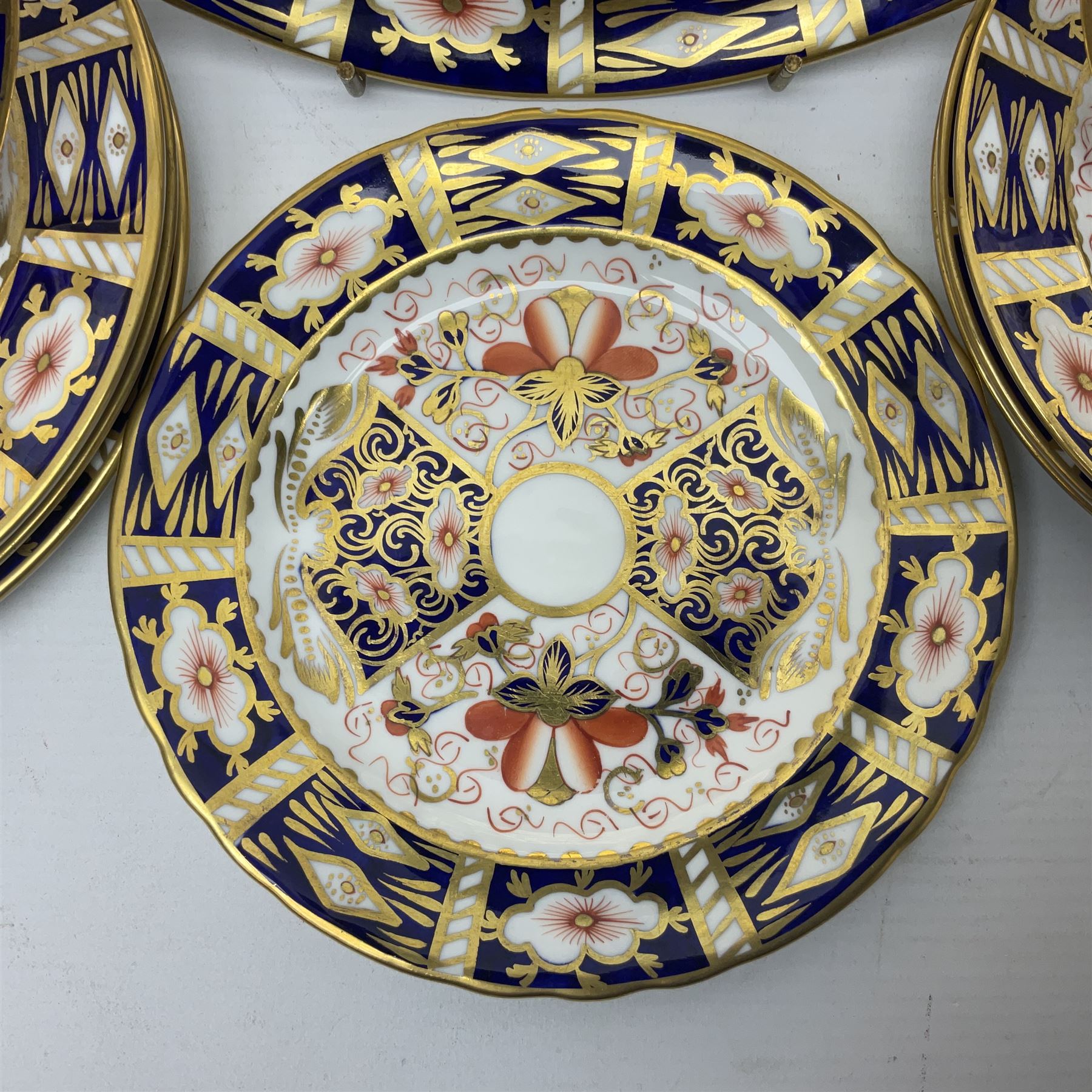 Ten Royal Crown Derby plates all in imari pattern 2451, in various sizes, comprising five D15.5cm, four D18cm and one D23cm