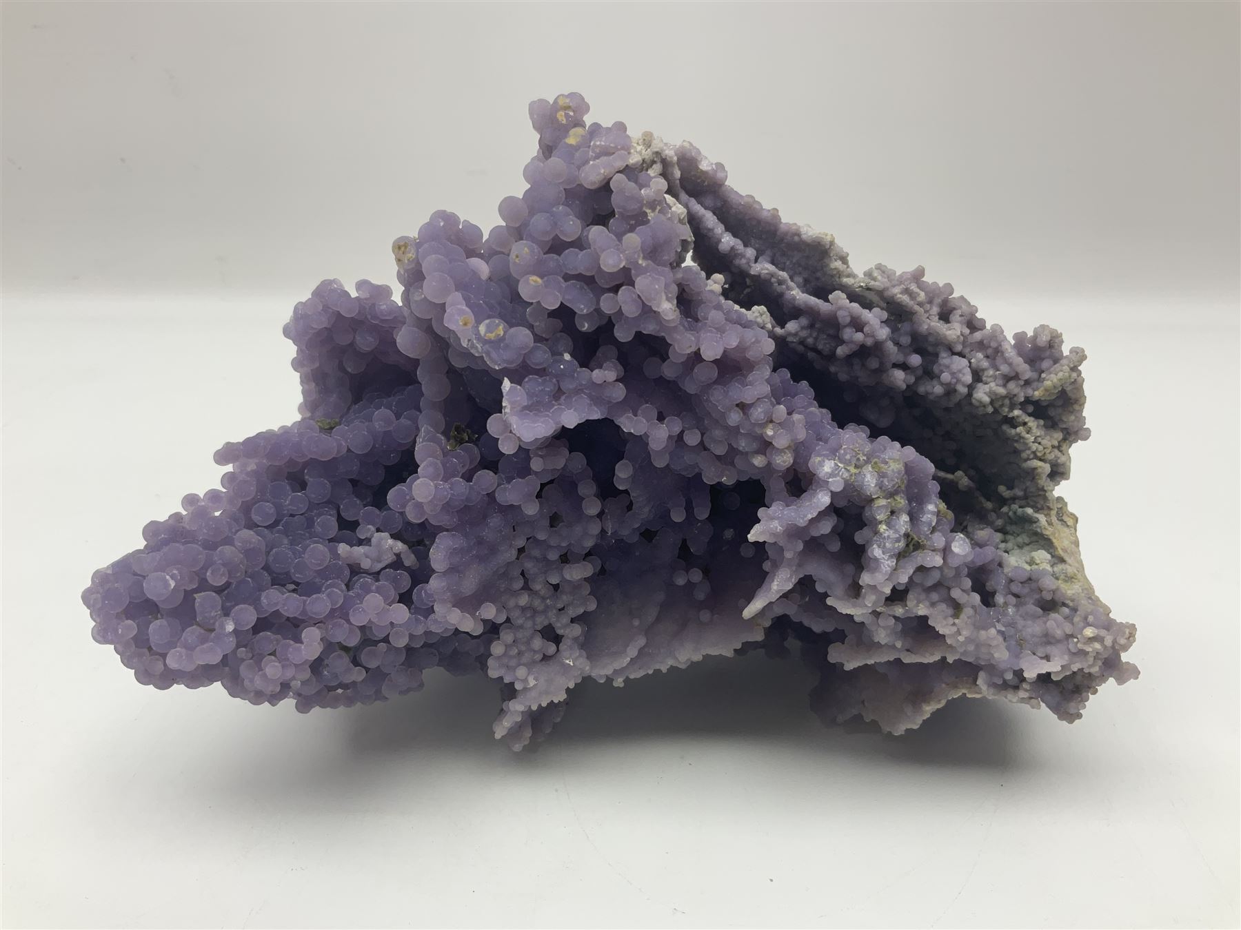 Grape agate cluster, formed of spherical quartz crystals, in purple tones, H15cm, L20cm