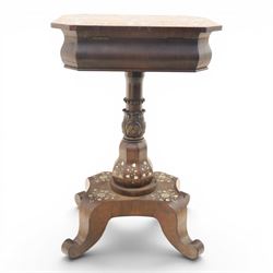 Victorian mahogany and mother-of-pearl inlaid work table, the octagonal hinged top enclosing a mirror and fitted compartmented interior, raised on a carved pedestal and quatriform platform base with scrolled feet