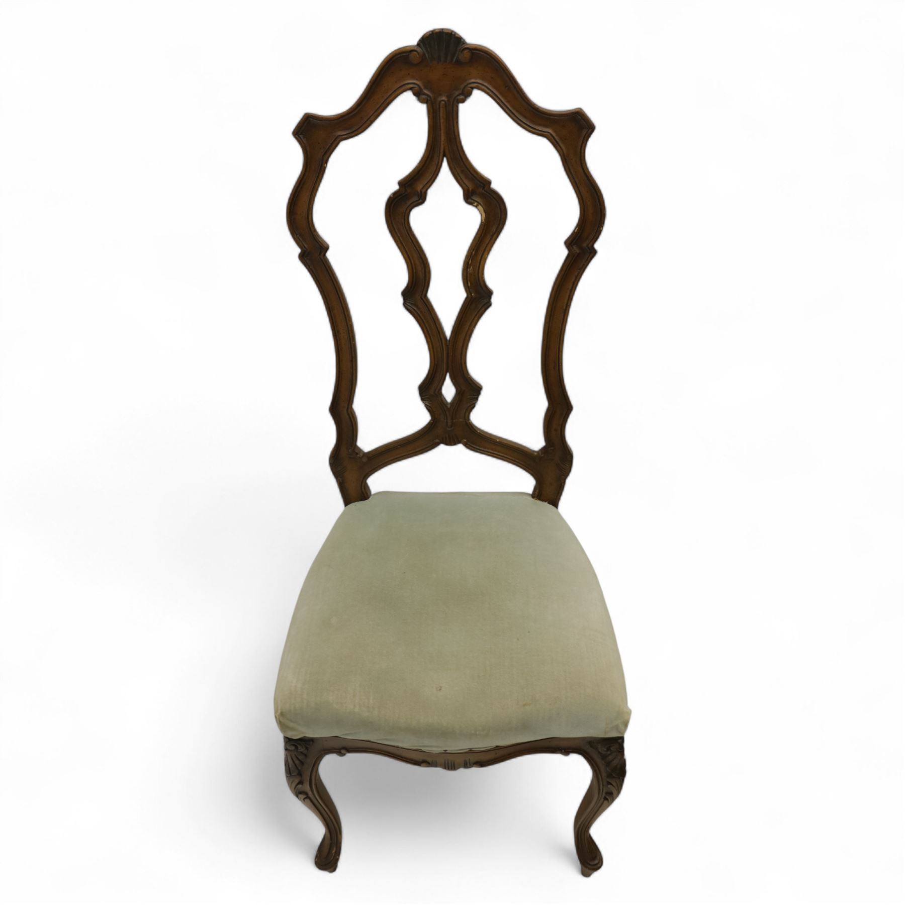 20th-century set of four French provincial-style stained beech dining chairs, pierced cartouche back with fan carving, with a scroll moulded frame above a padded serpentine seat on cabriole legs 