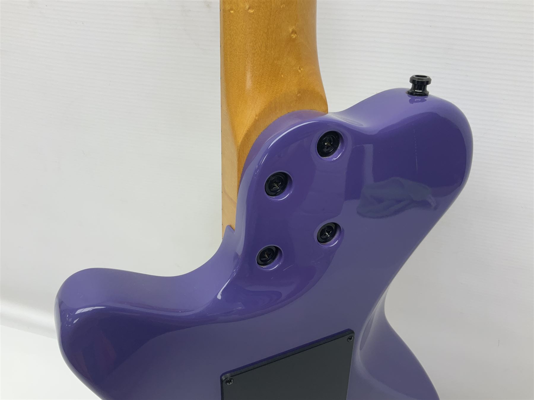 Canadian Godin SD electric guitar in two-tone purple/white with bird's eye maple neck and tremolo, serial no.98455463, L100cm overall; in soft carrying case.