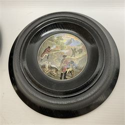 Six framed Prattware pot lids comprising 'Harbour of Hong Kong', 'Sandringham the Seat of HRH The Prince of Wales', 'Sebastopol', 'The Square, Strasbourg', 'Shooting Bears' and one other, each in plain and ebonised frames, largest D18.5cm (including frame) (6)