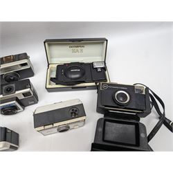 Canon EOS 650 camera, serial no 2122736, in carry case with some accessories, together with an Olympus XA2 camera and ten Kodak Instamatic cameras and two similar