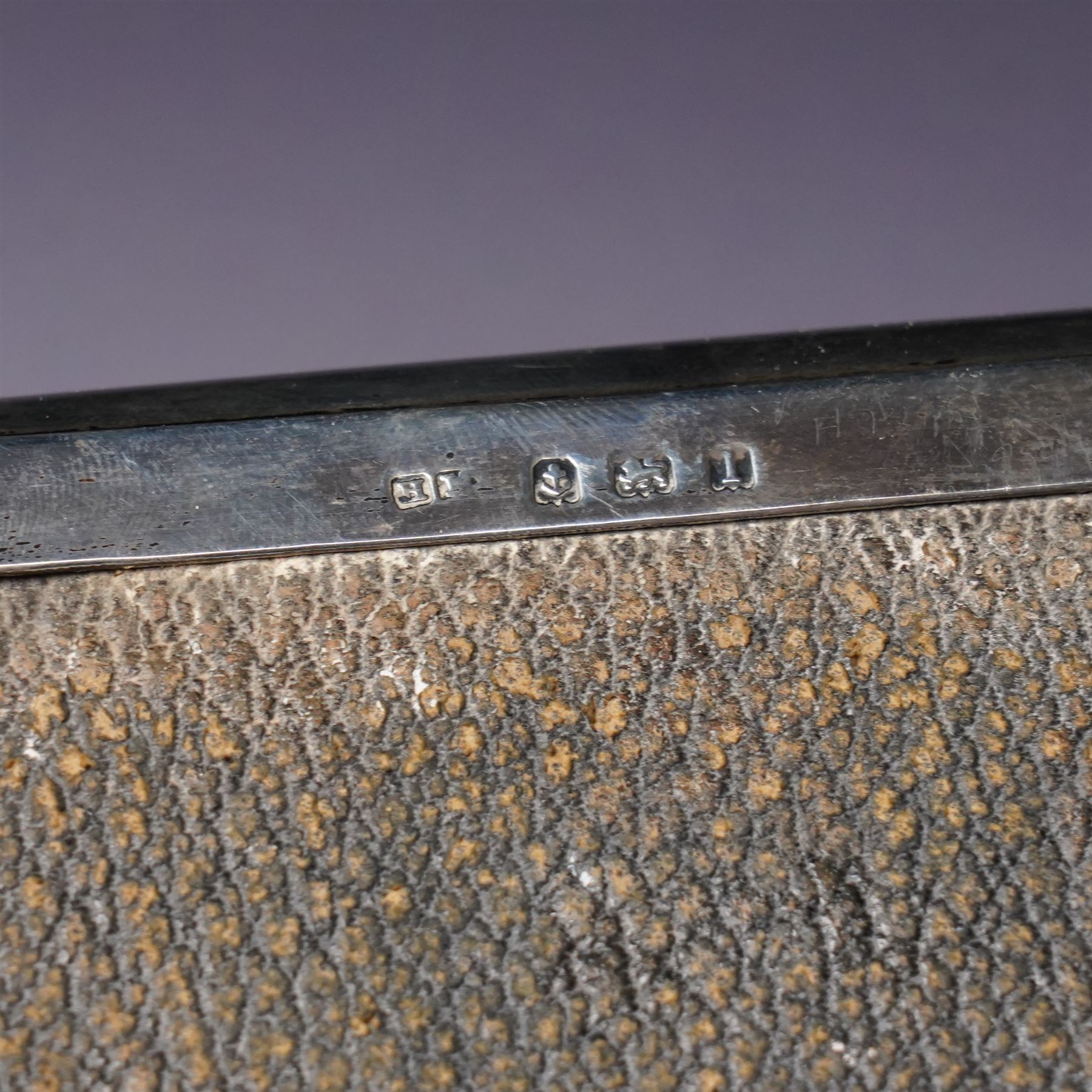 Edwardian silver rectangular trinket box with padded interior, the hinged cover inset with a tortoiseshell panel with pique decoration and on shaped supports W12cm Birmingham 1910 Maker Henry Matthews