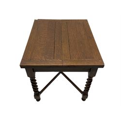 Early 20th century oak barley twist extending table, two fold-over leaves with pull-out stays, spiral turned supports joined by x-stretchers