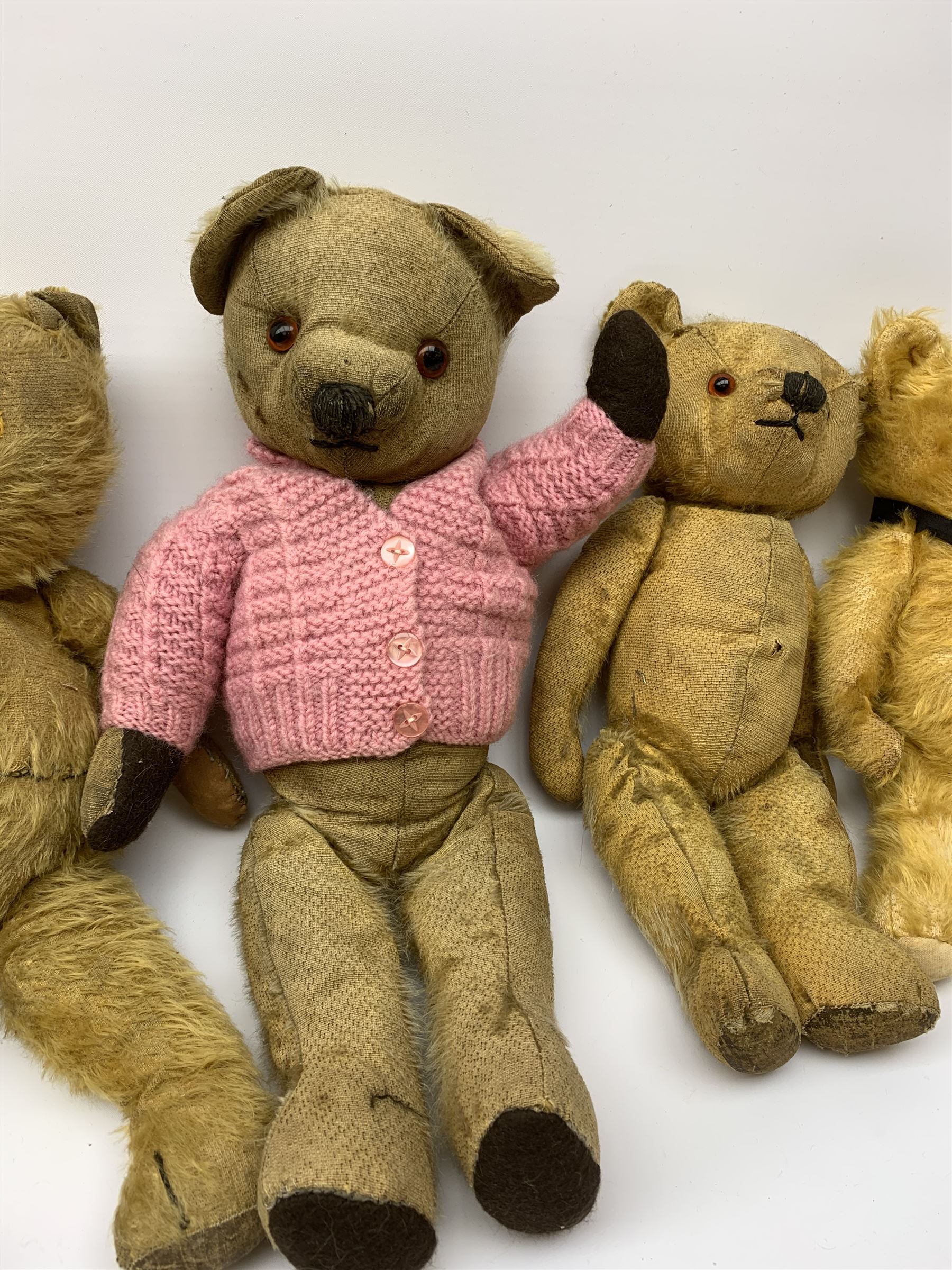 Five English teddy bears 1930s-50s including Chad Valley with swivel jointed head, glass type eyes and vertically stitched nose and mouth and jointed limbs with felt paw pads H14