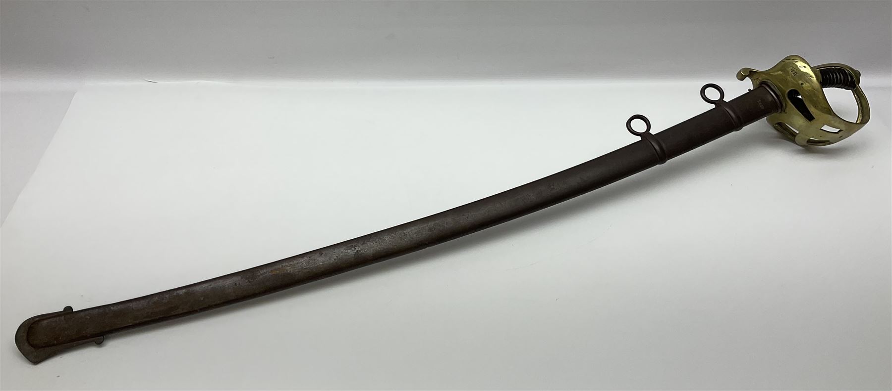 19th Century German (Saxony) Cavalry Sword, the 90.5cm single edge curved steel blade with narrow fuller to the back edge at each side, engraved with a crowned AR monogram and coat of arms, stamped with crowned AR, the back edge engraved C.v Keller im Solingen 1862, the brass half basket hilt with three flat curved bars, applied badge missing, marked G.R. 4, with ribbed leather covered grip and leather finger strap; in steel scabbard with two fixed suspension rings to one side and stamped G.R. II 118; L109.5cm overall