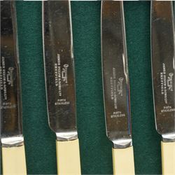 James Dixon and Sons canteen of plated table cutlery for eight covers, including bone handle knives etc, in oak cutlery box with green baize lining, comprising twenty-four knives and twenty-four forks, two ladles, twenty-eight spoons of various sizes; and a plated punch bowl 