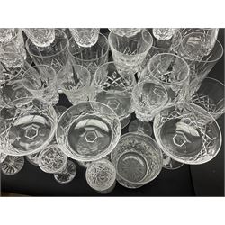 Set of Waterford Crystal Lismore pattern drinking glasses for six people, including hock glasses, goblets, champagne flutes,  sherry glasses, liqueur glasses, hi ball glasses, whisky glasses, brandy balloons, etc, all with etched maker's mark beneath  (62)