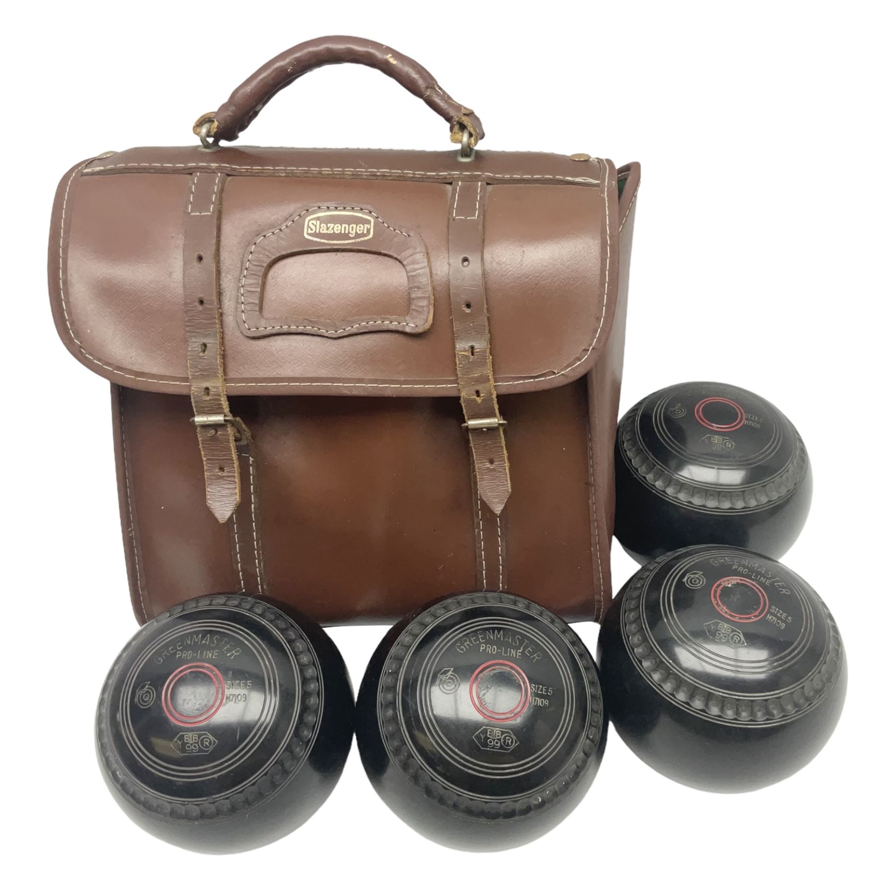 Eight Greenmaster lawn green bowling balls, comprising set of four size