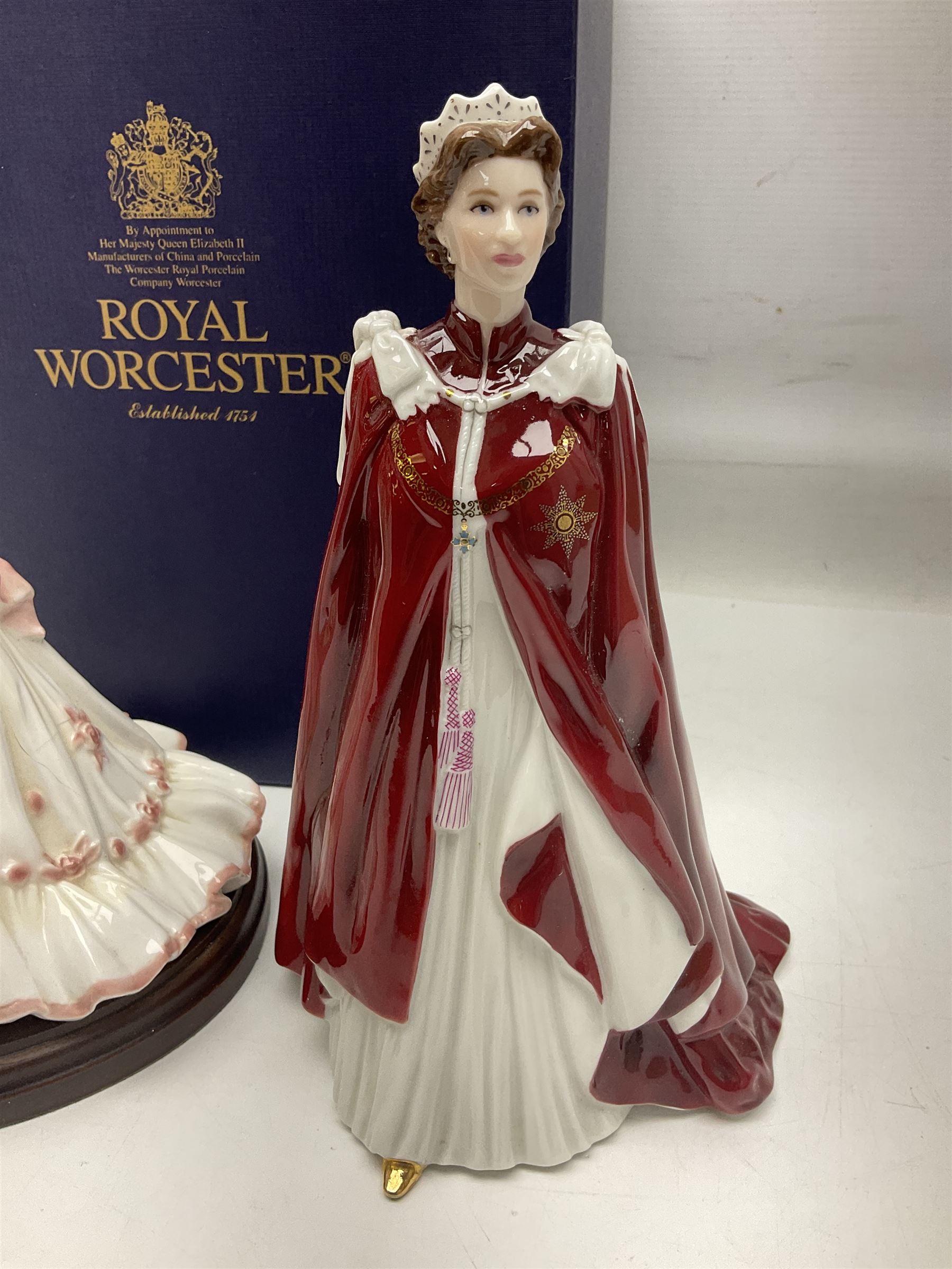 Three Royal Worcester figures, comprising Glyndebourne, with original box, Royal Worcester Special Even 1998 Elizabeth, with certificate and original box, and In Celebration of the Queens 80th Birthday 2006 