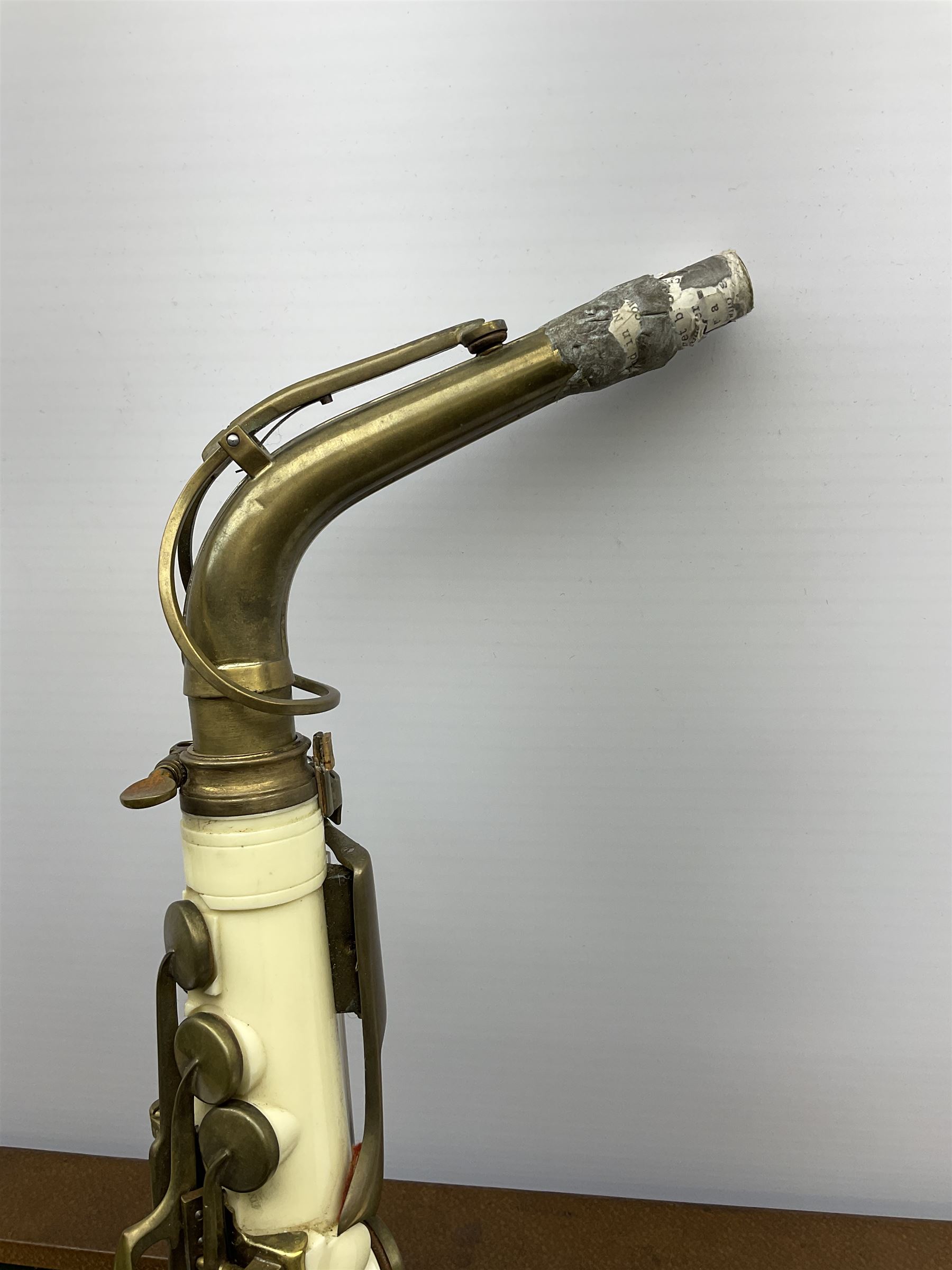 1950s Grafton injection moulded cream acrylic plastic alto saxophone designed by the Italian Hector Somorisen and distributed by John E. Dallas & Sons London, serial no.10776 L66cm, in original fitted carrying case