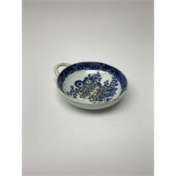 Late 18th/early 19th century Leeds Pottery egg drainer, the pierced bowl of circular form decorated with blue transfer printed floral spray and floral border, the twisted handle with foliate mounts, bowl D9cm