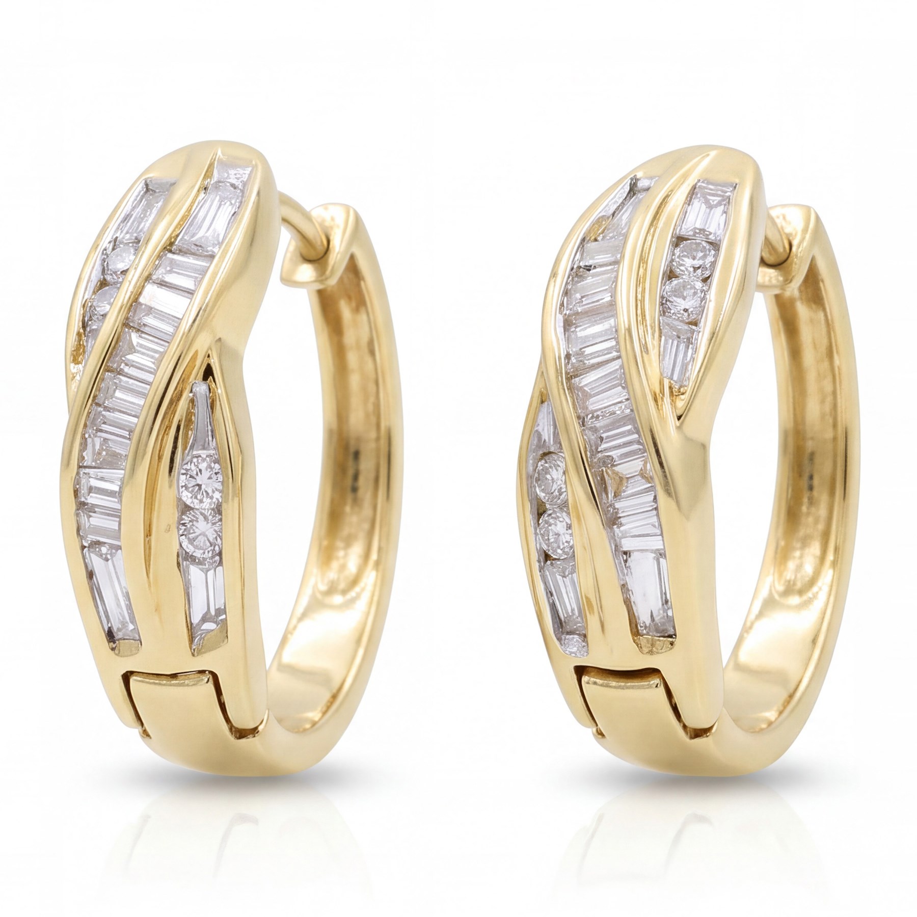 Pair of 14ct gold diamond crossover hoop earrings, each set with tapered baguette and round brilliant cut diamonds, stamped