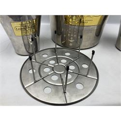 Stainless steel Laurent-Perrier champagne bucket, with engraved brass plaque and grip to swing handle, together with two matching smaller, largest D38cm (3)