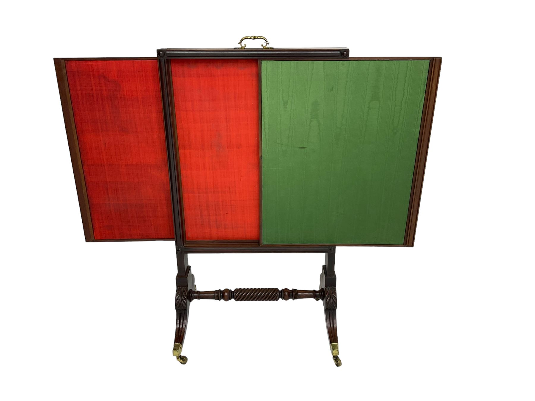 Regency mahogany screen with two horizontal and one vertical pull-out panels, on base with carved sabre legs and rope-twist stretcher