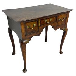 18th century oak low-boy, rectangular top over three crossbanded and cock-beaded drawers, ogee and stepped arch apron, on cabriole supports 