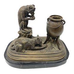 Bronze figure group, modelled as a cat and a seated monkey besides a cauldron, after Bonheur with a marble base 