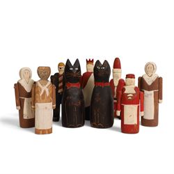 American Folk art figures, by Wolf Creek, comprising two cats, Father Christmas, Mrs Claus...