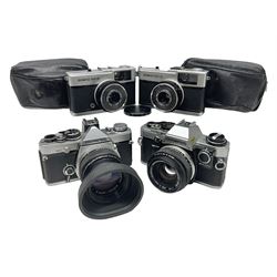 Four Olympus camera bodies, including Olympus OM10, serial no 20744269, with 'Olympus OM-System Zuiko Auto-S 50mm 1:1.8' lens serial no 3633644, Olympus OM-2 camera body serial no 460280 with 'Olympus OM-System G.Zuiko Auto-s 1:1.4 f=50mm' lens, serial no 729750, etc 
