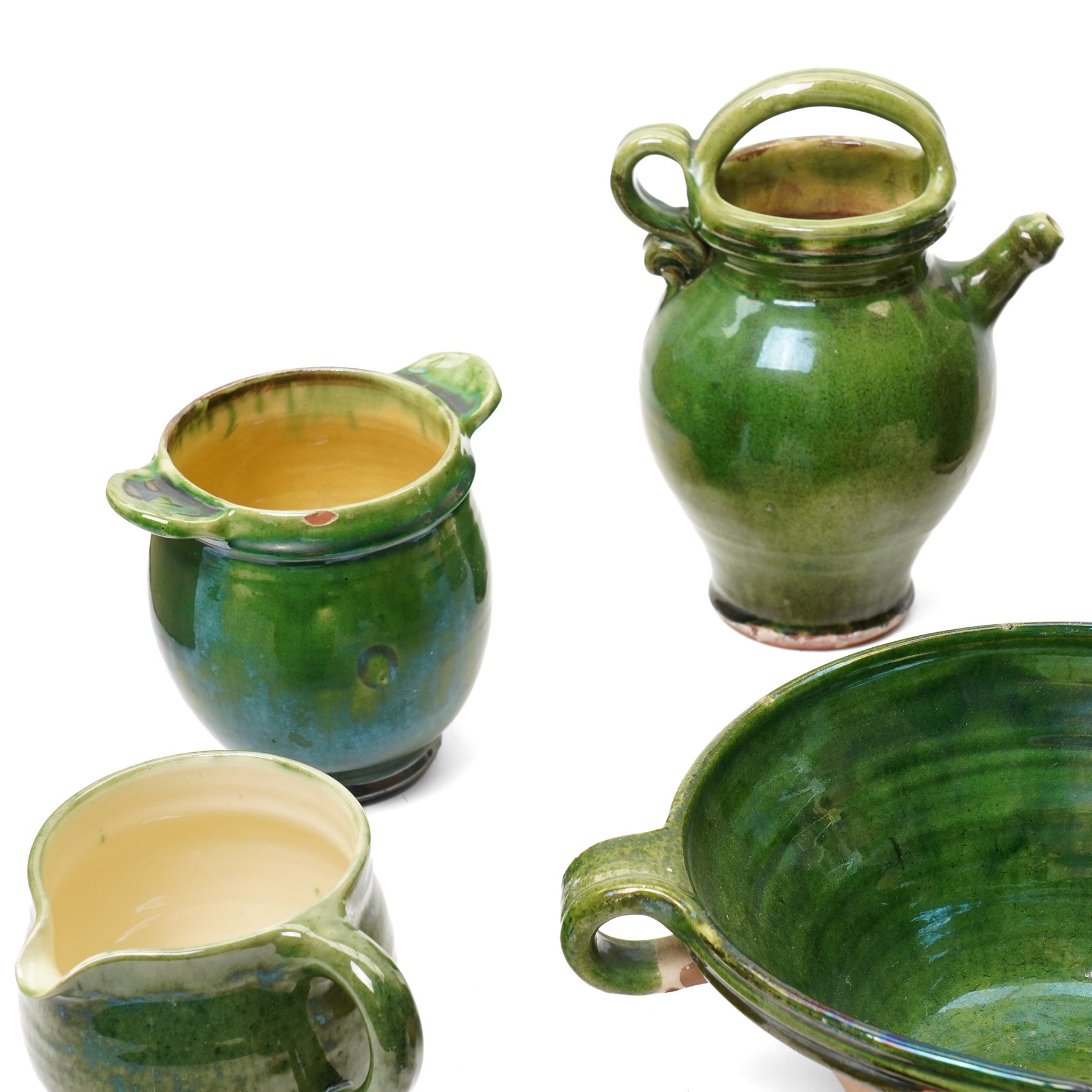 Collection of studio pottery, in green glazes, mostly unmarked, tallest H23cm (7)
