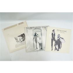 Large collection of records including Genesis, Fleetwood Mac, Dire Straits, U2 etc