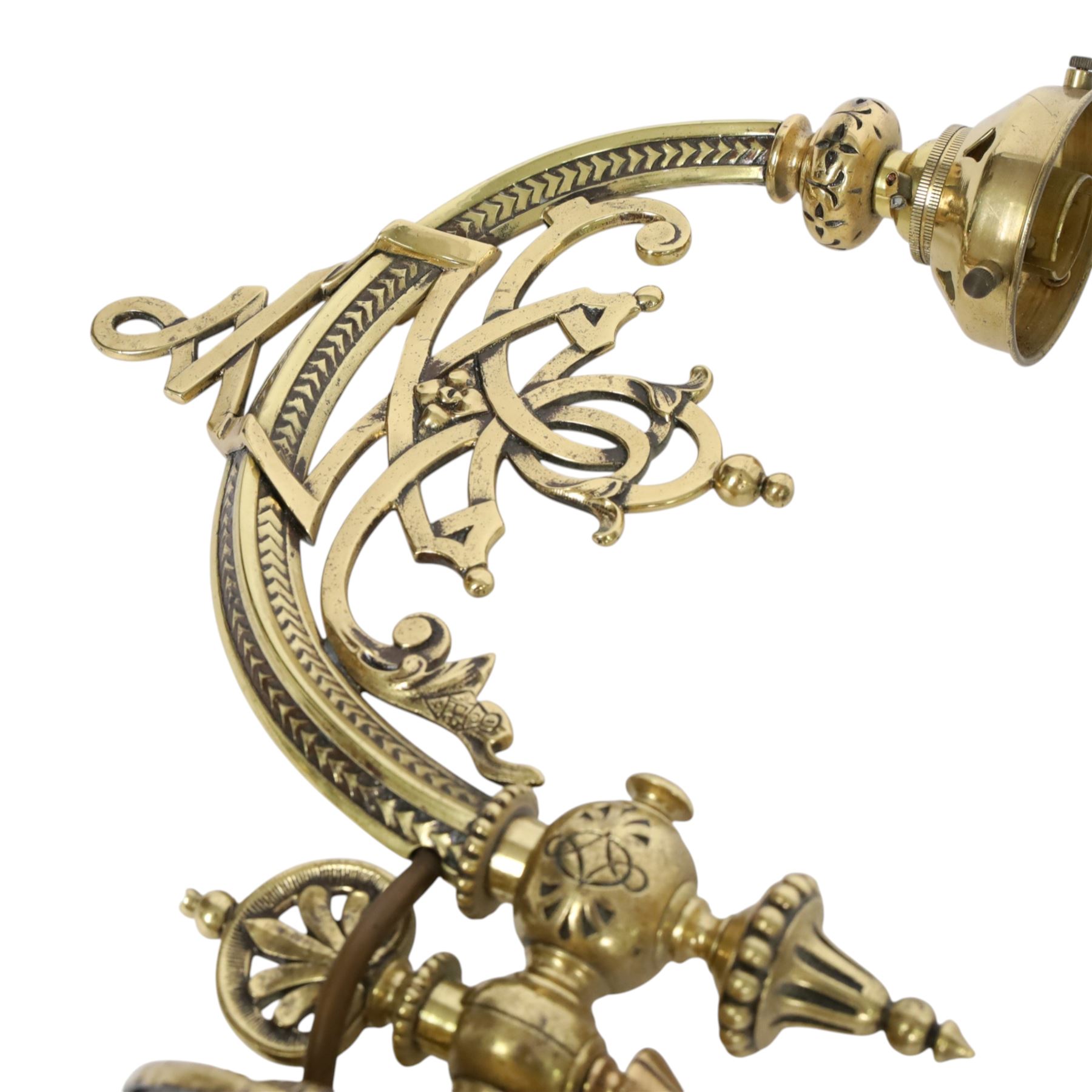 Pair of 19th century brass wall sconces, the articulated curved arms leading to single socket fitting detailed with entwined strapwork, Victorian diamond mark H24cm D28cm